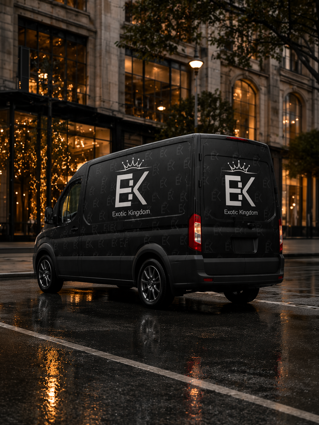 Exotic Kingdom branded delivery van on a city street at night.